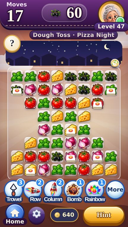 A Pizza Night level on a phone, with tomatoes, cheese and basil pieces