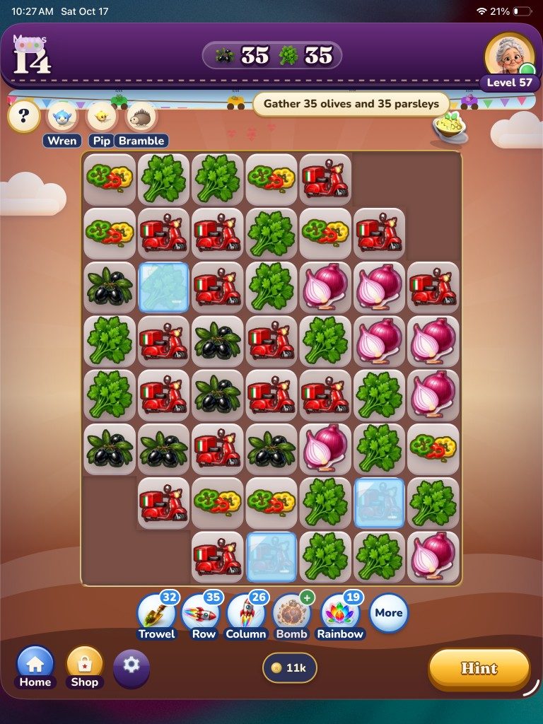 Level 57 on iPad: gather 35 olives and 35 parsleys, with icy tiles to clear