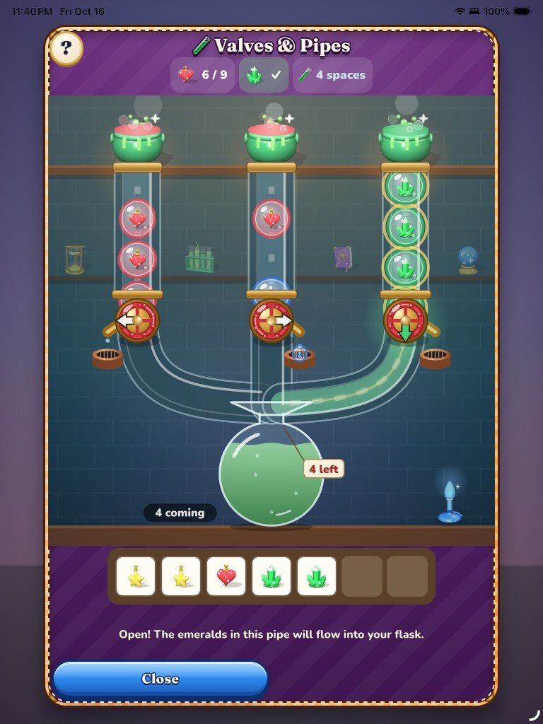 The Valves and Pipes mini-game on iPad, turning valves to send emeralds and hearts into a flask